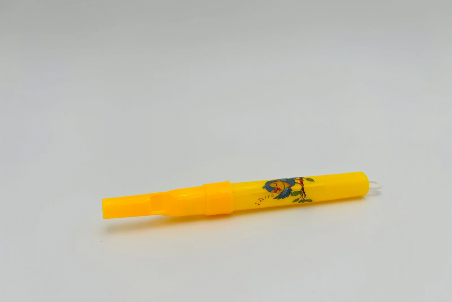 Sifflet piston oiseau