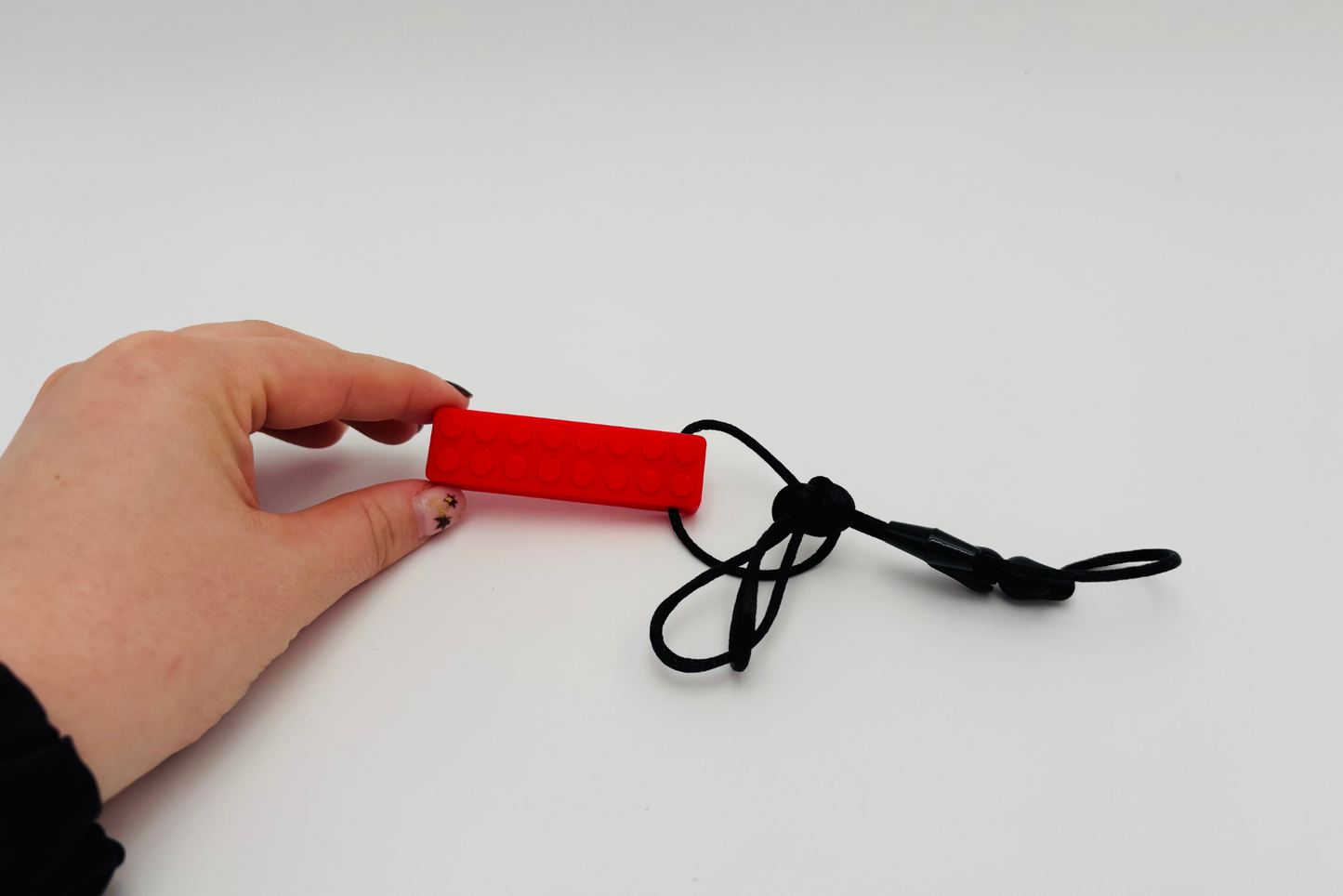 Collier sensoriel à mâcher domino