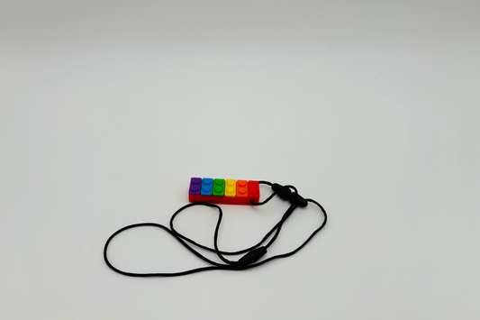 Collier sensoriel à mâcher domino