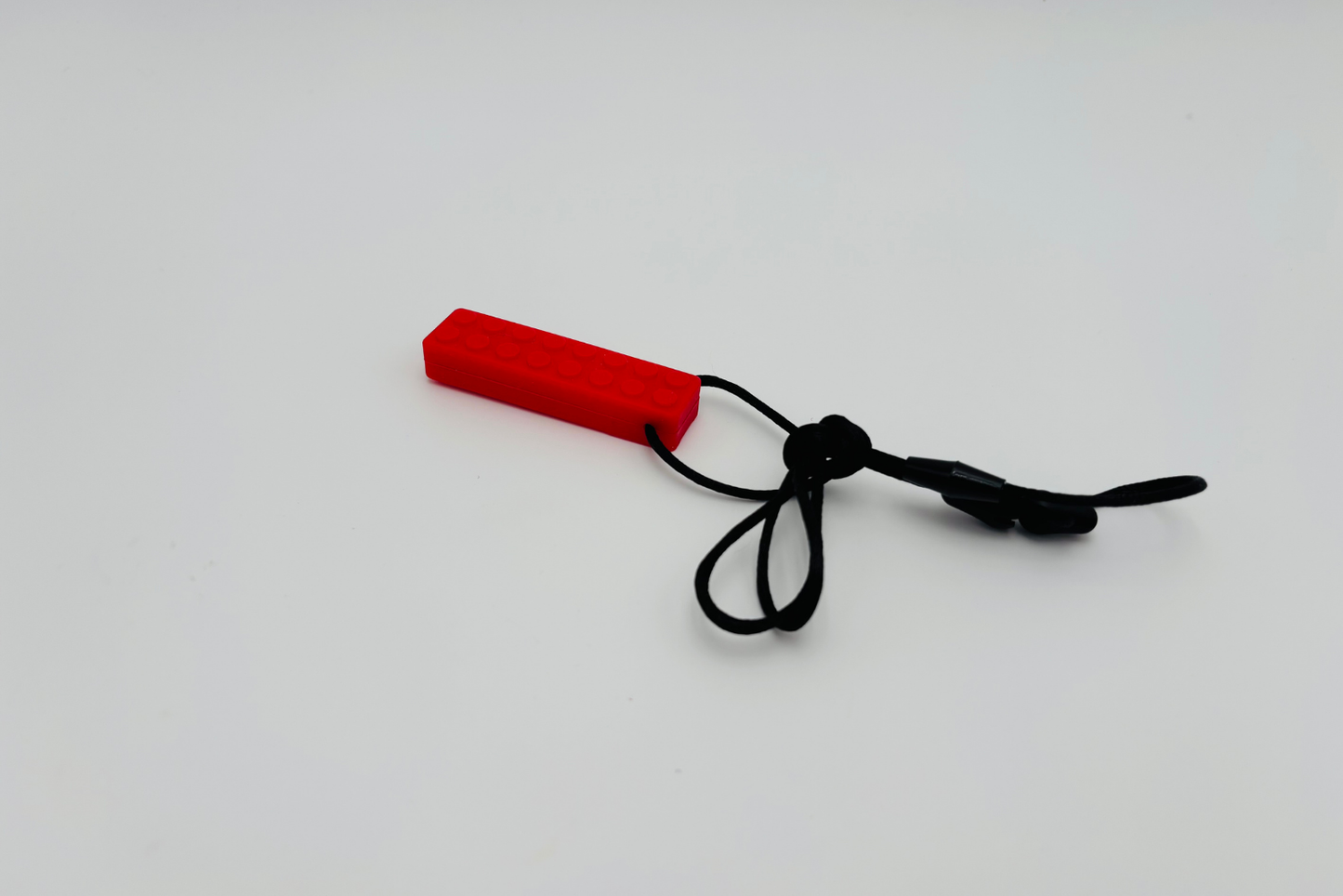 Collier sensoriel à mâcher domino