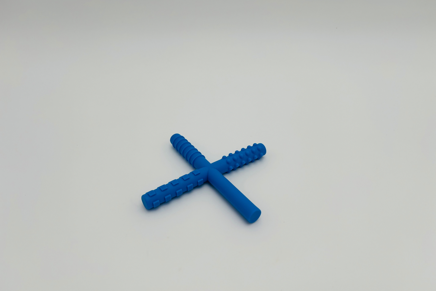 Outil de mastication forme X