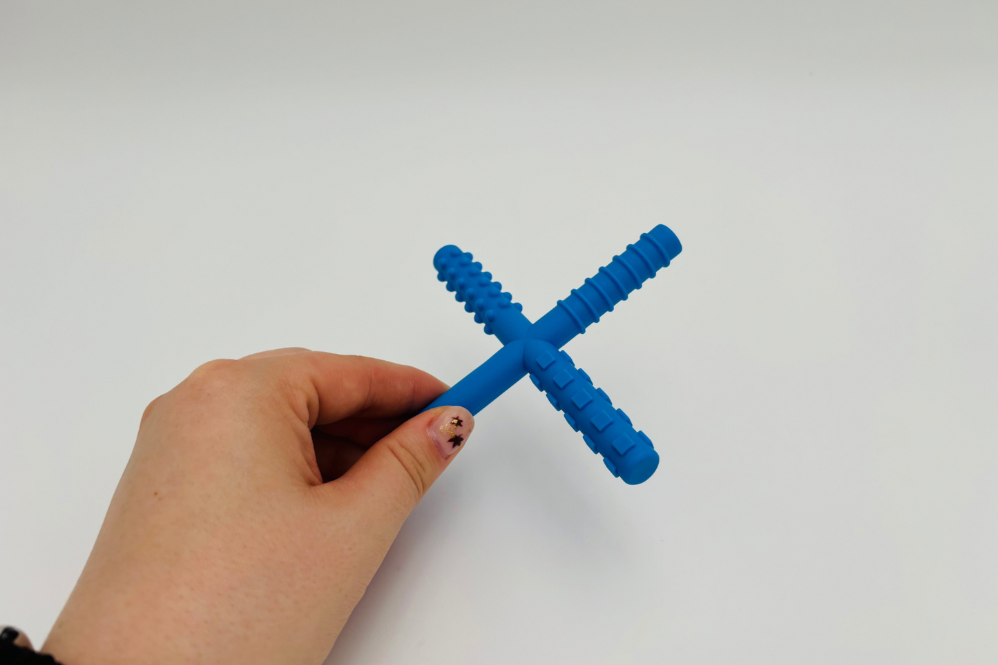 Outil de mastication forme X