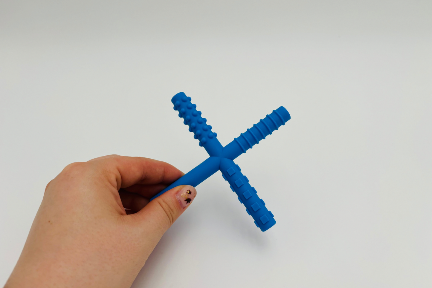 Outil de mastication forme X