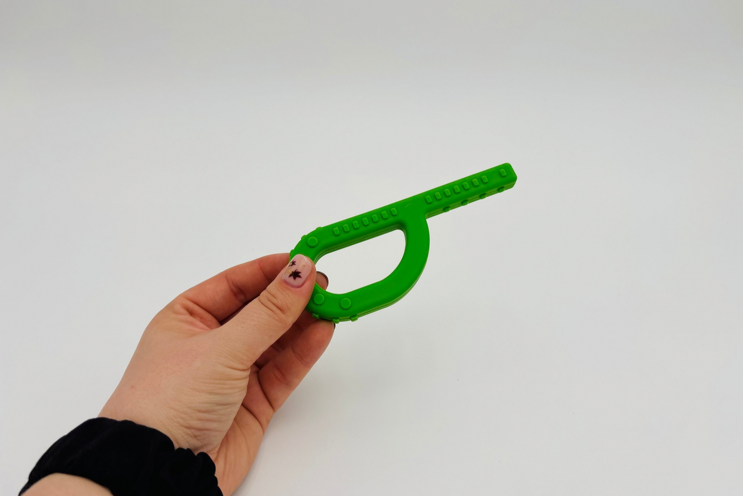 Outil de mastication forme "P" vert texturé